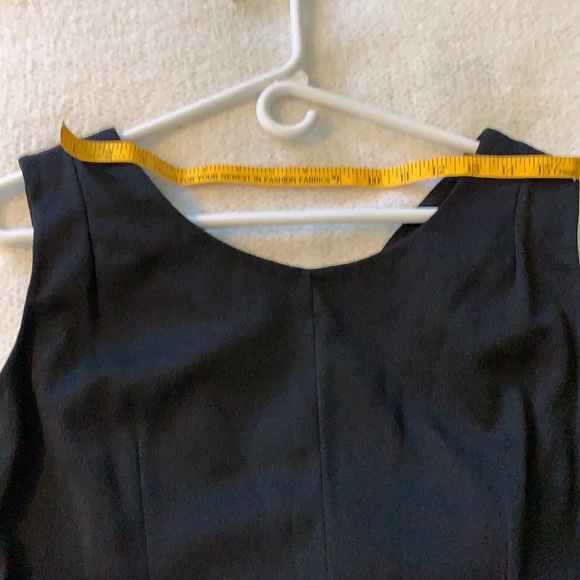 Simple black gown with embellished center. - Picture 6 of 7